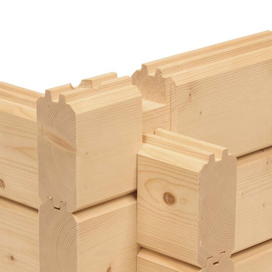 Die Ecke eines Holz-Gartenhauses von Finnhaus Wolff aus massiven Blockbohlen