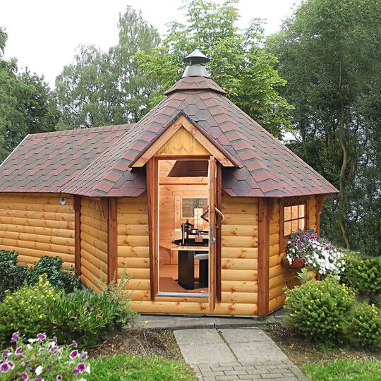 Gemütliche Grillkota mit Sauna von Finnhaus Wolff im Garten